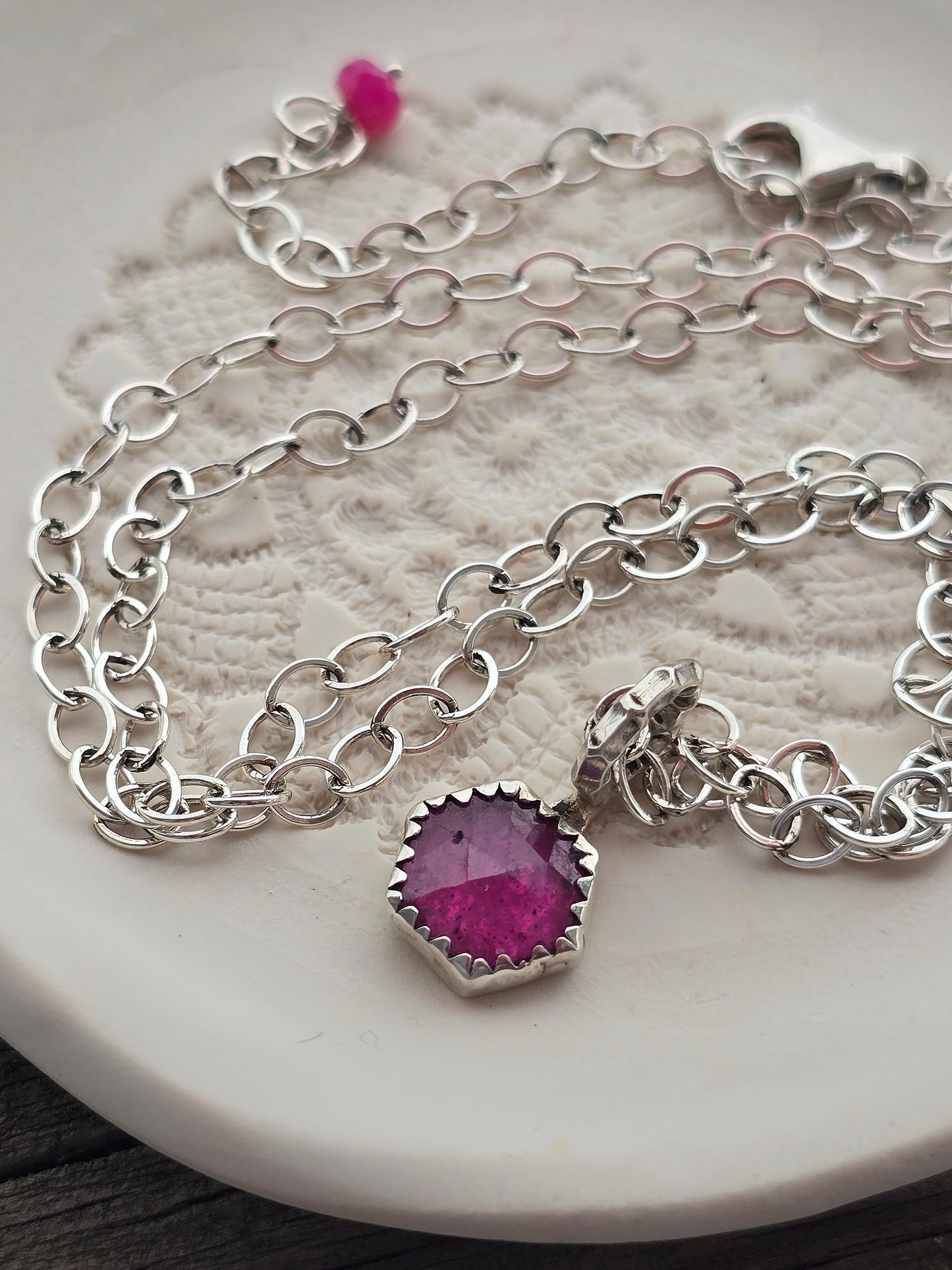 raspberry beret necklace